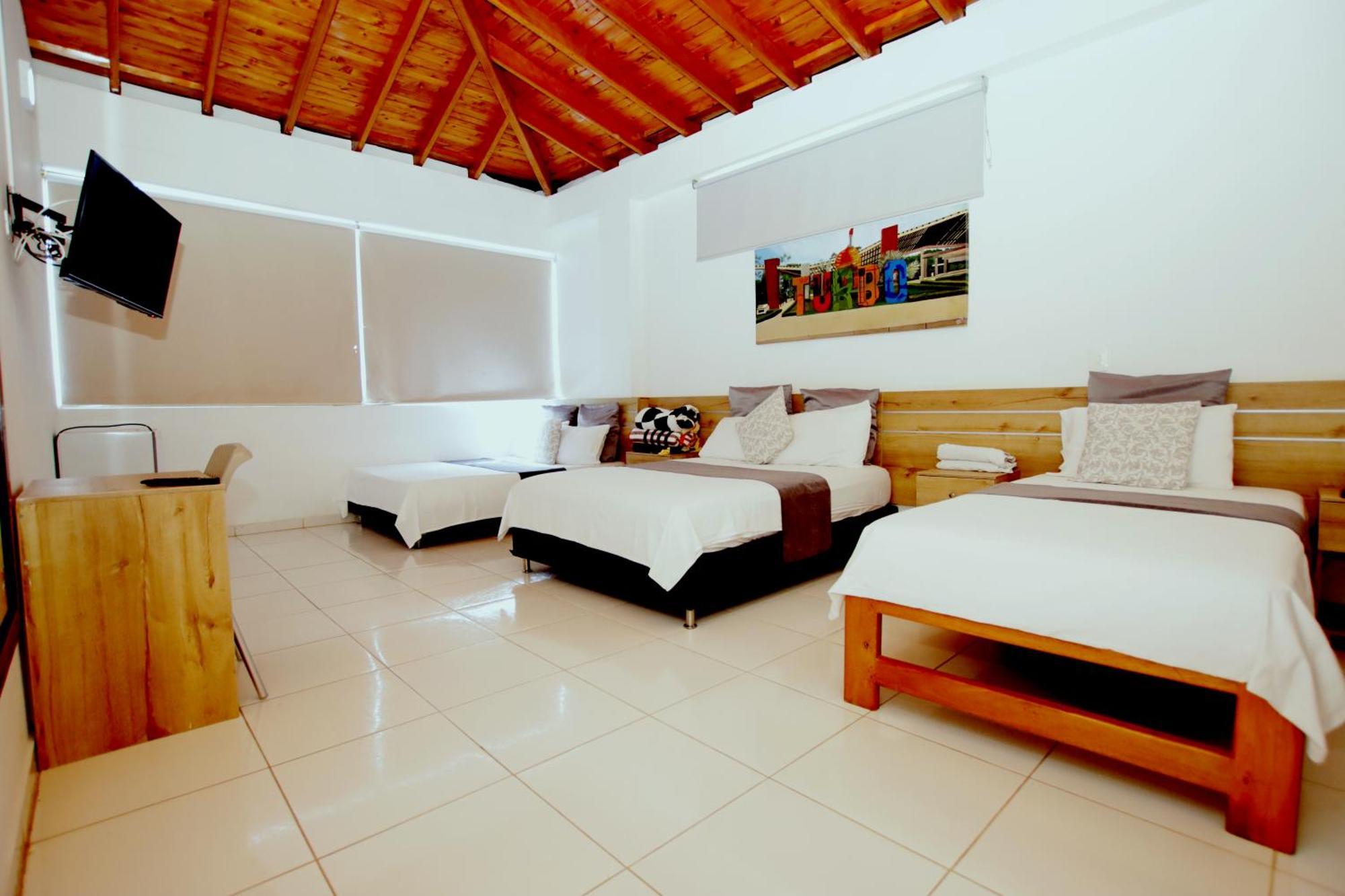 Hotel Blue Paradise Inn Turbo Bagian luar foto